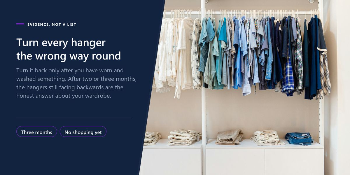 A tidy white clothes rail with folded stacks on the shelf beneath it, beside a panel explaining the reversed-hanger method.