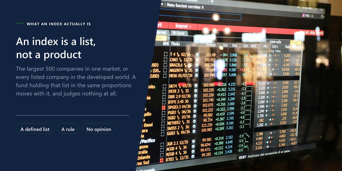 A market data board in a public concourse listing company names against their prices in red and green, beside a panel explaining that an index is a defined list rather than a product.